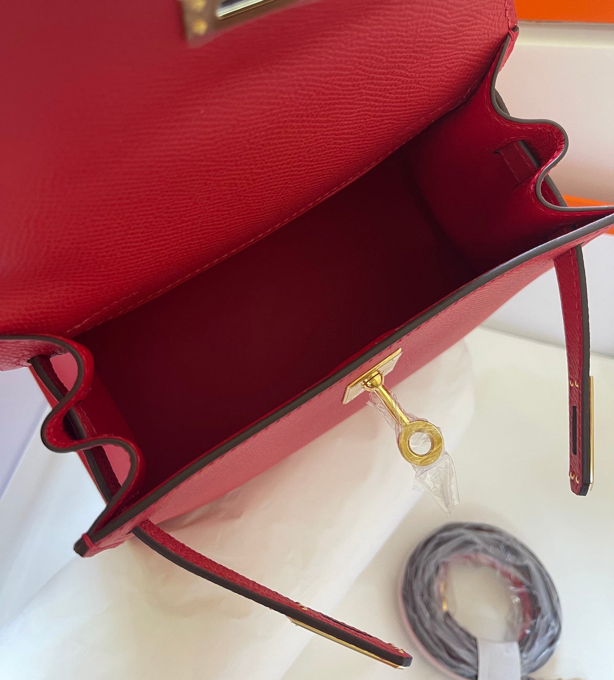 KELLY MINI 20 BAG IN RUBY RED CALFSKIN WITH GOLD HARDWARE