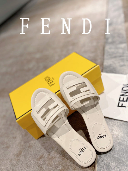 FENDI BAGUETTE SLIDES IN WHITE LAMBSKIN