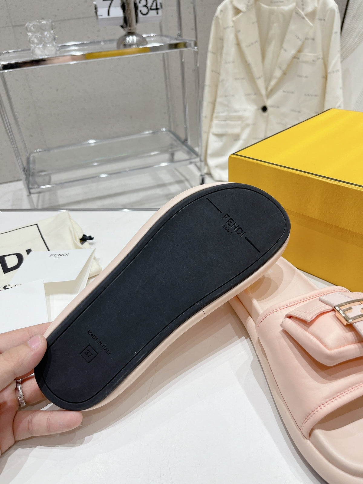 FENDI BAGUETTE SLIPPERS IN PASTEL PINK LAMBSKIN WITH GOLD HARDWARE