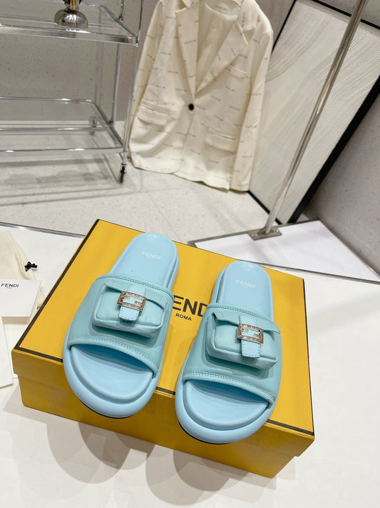 FENDI BAGUETTE SLIPPERS IN SKY BLUE LAMBSKIN WITH GOLD HARDWARE