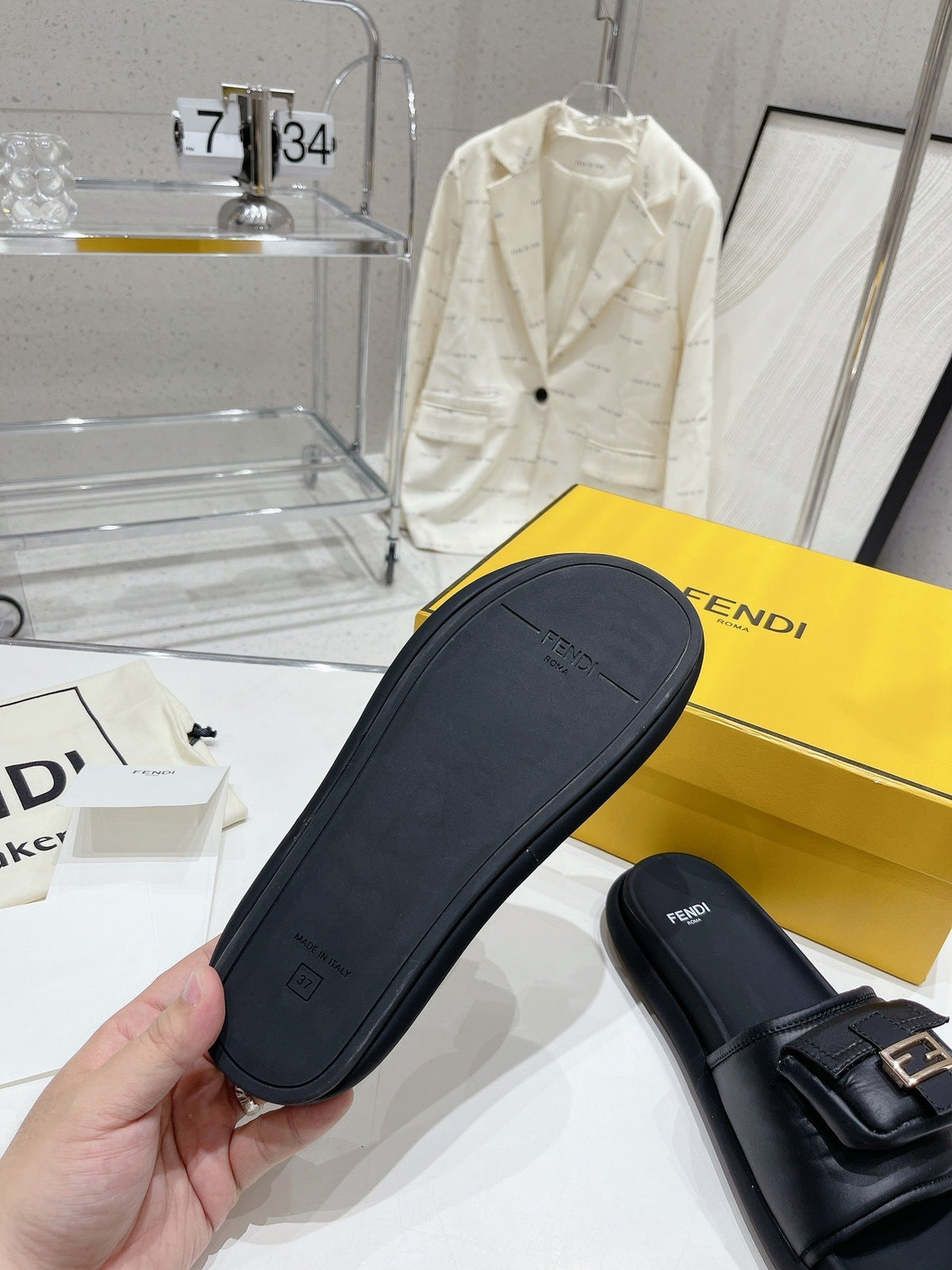 FENDI BAGUETTE SLIPPERS IN BLACK LAMBSKIN WITH GOLD HARDWARE