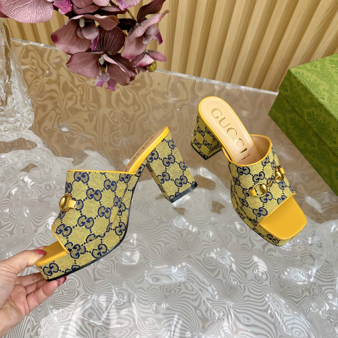 HORSEBIT SLIDE SANDAL IN TUSCANY YELLOW MONOGRAM CANVAS AND SHEEPSKIN LINING