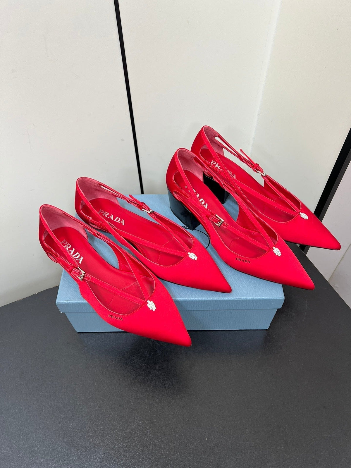 CUT-OUT BALLERINA FLAT IN CLASSIC RED SATIN ATTACHED BEAD BUCKLE