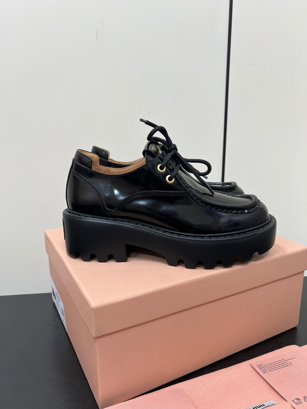 LACE-UP LOAFERS WITH THICK SOLE IN BLACK SHINY SHEEPSKIN