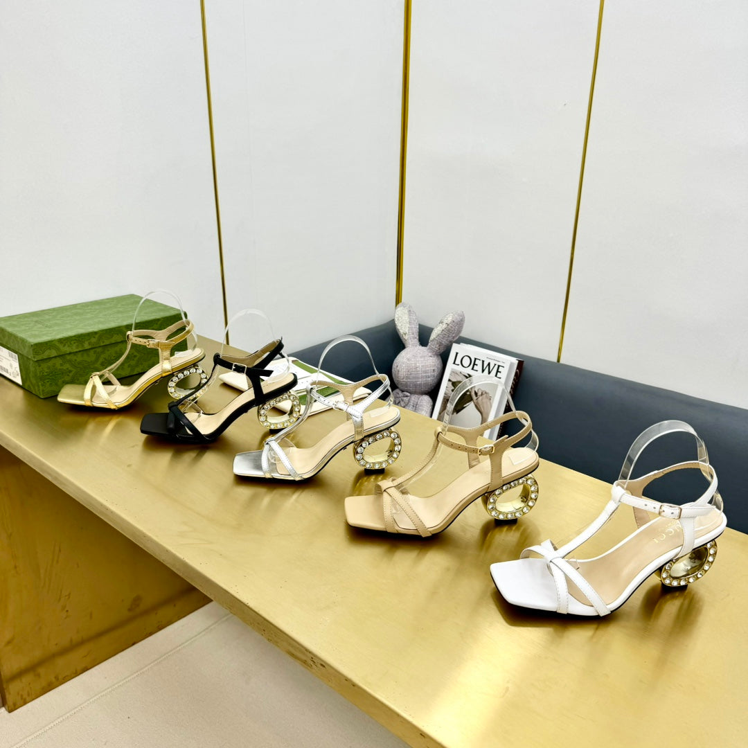 MEDIUM-HEEL SANDAL IN BLACK CALFSKIN GOLD HARDWARE WITH RHINSTONES