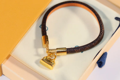 LV ALMA PINK GOLD CANVAS