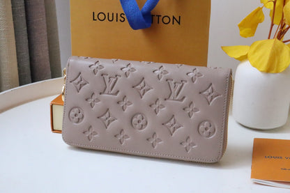 ZIPPY WALLET 19 BEIGE EMBOSSED LAMBSKIN