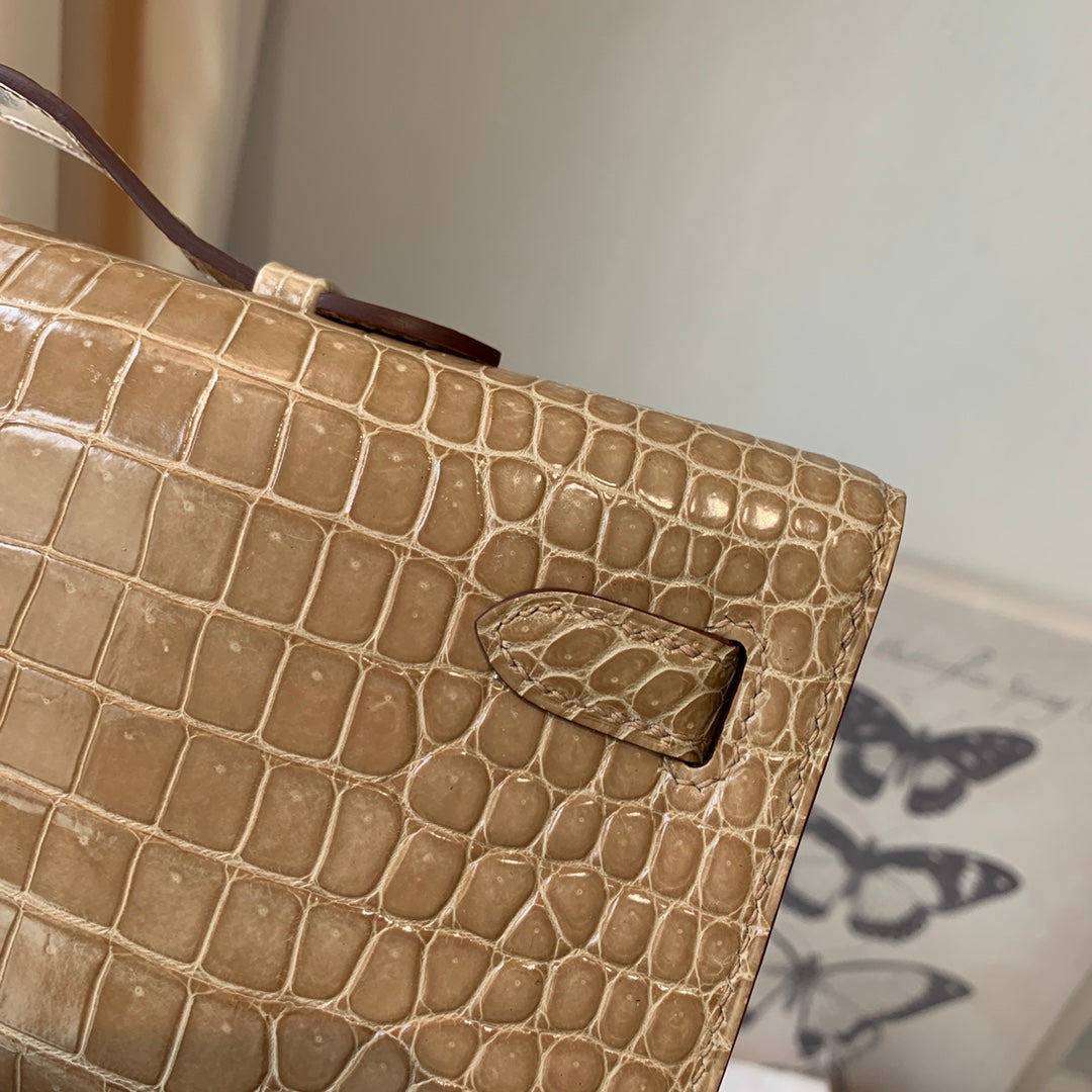 KELLY CUT 31 IN TORTILLA BROWN ALLIGATOR LEATHER WITH SILVER HARDWARE