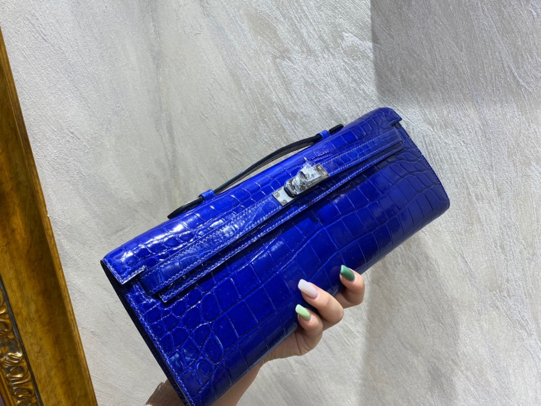 KELLY CUT 31 IN ADMIRAL BLUE SHINNY ALLIGATOR LEATHER WITH SILVER HARDWARE