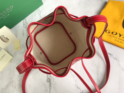 PETIT FLOT BUCKET BAG 22 IN CLASSIC RED GOYARDINE CANVAS AND LAMBSKIN TRIM