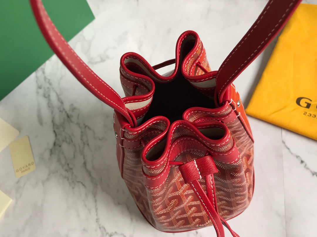 PETIT FLOT BUCKET BAG 22 IN CLASSIC RED GOYARDINE CANVAS AND LAMBSKIN TRIM