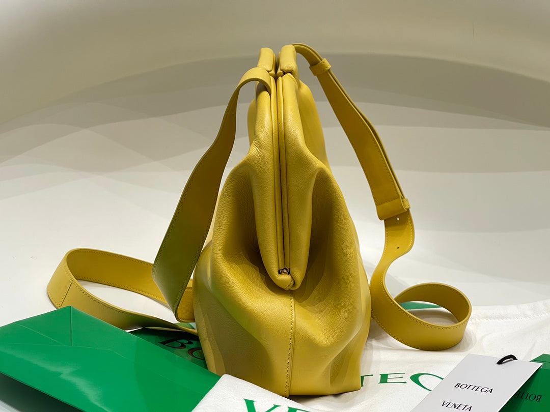 TRIANGLE HANDLE BAG 31 IN DANDELION YELLOW LAMBSKIN