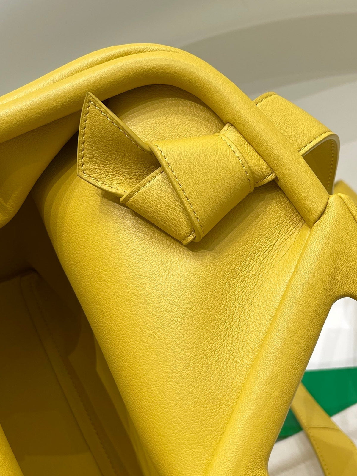 TRIANGLE HANDLE BAG 31 IN DANDELION YELLOW LAMBSKIN