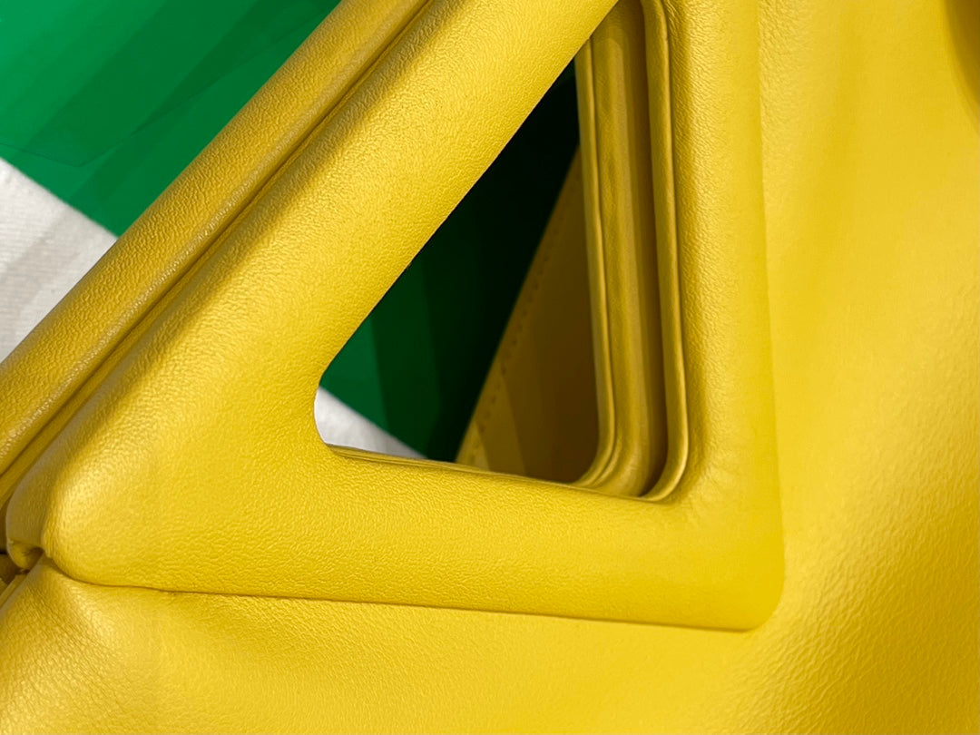 TRIANGLE HANDLE BAG 31 IN DANDELION YELLOW LAMBSKIN
