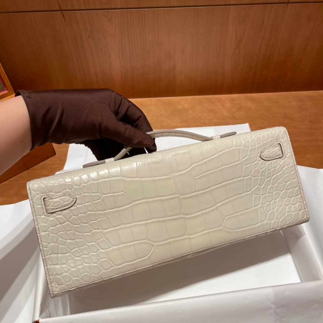 KELLY CUT 31 IN WHITE CREAM ALLIGATOR LEATHER WITH GOLD HARDWARE