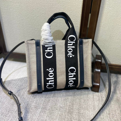 SMALL STRAP WOODY TOTE BAG 26.5 IN BEIGE LINEN CANVAS BLACK WEBBING DARK BLUE CALFSKIN