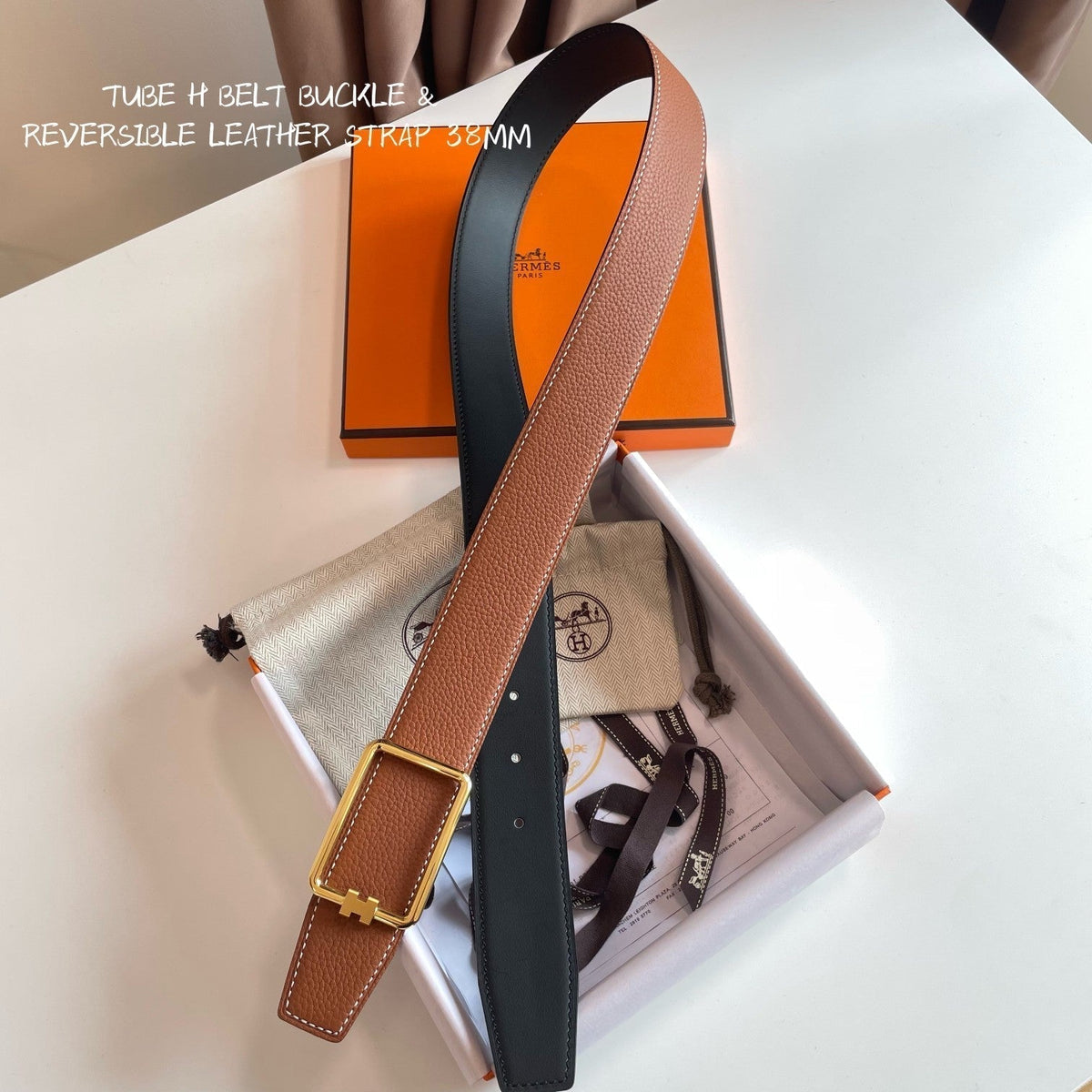 TUBE H BELT BUCKLE & REVERSIBLE BLACK AND CINNAMON BROWN LEATHER STRAP 38MM GOLD HARDWARE