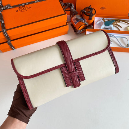 JIGE ELAN 29 CLUTCH IN WHITE CALFSKIN WITH GARNET RED LIZARD SKIN