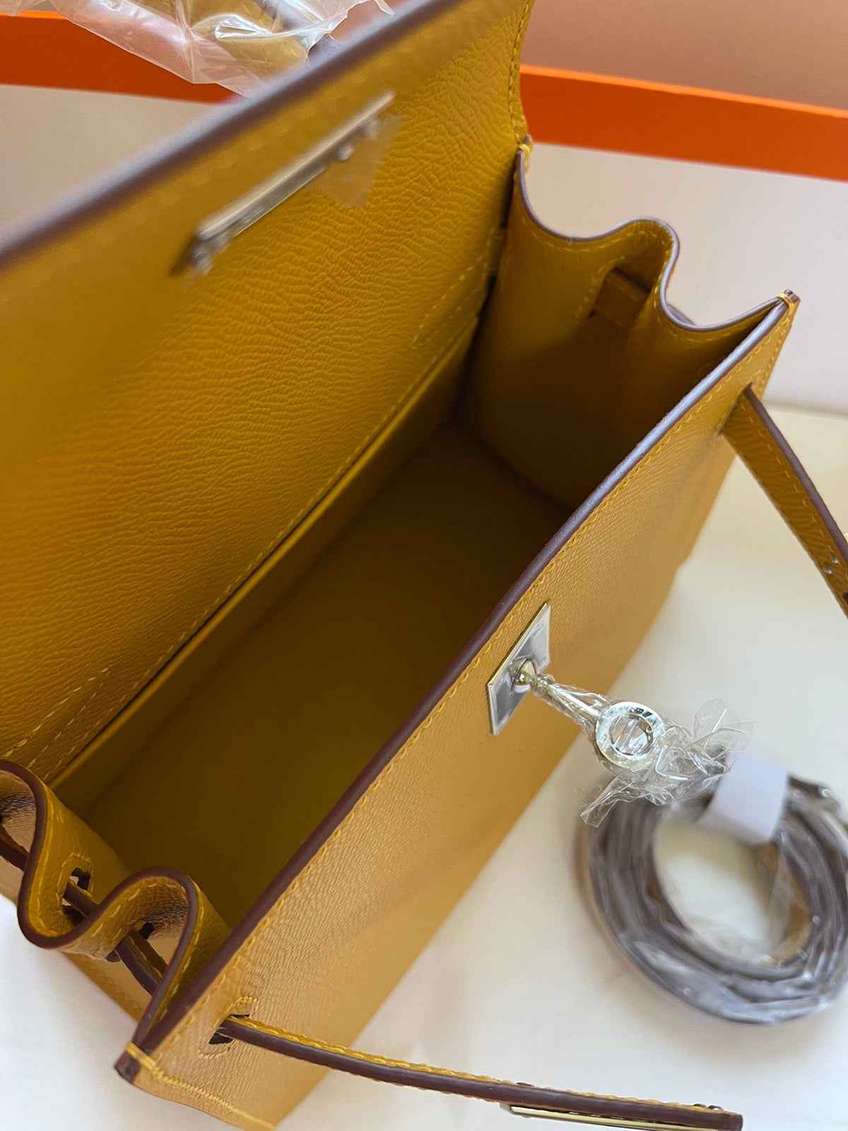 KELLY MINI 20 BAG IN DIJON YELLOW CALFSKIN WITH GOLD HARDWARE