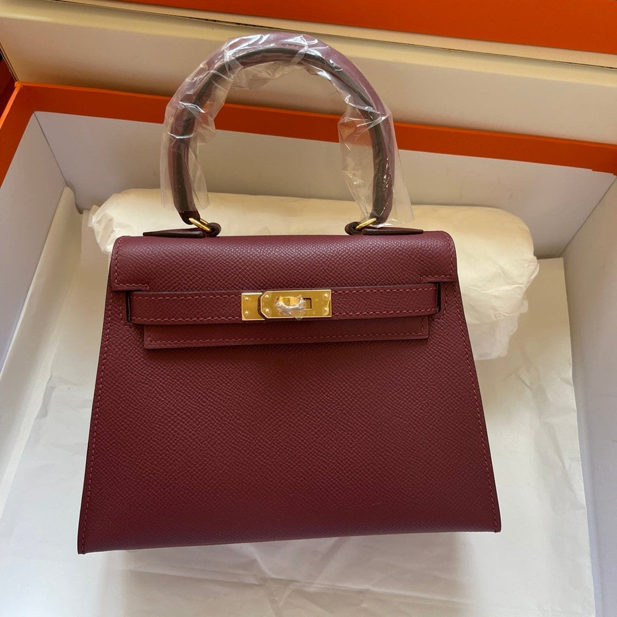 KELLY MINI 20 BAG IN GARNET RED CALFSKIN WITH GOLD HARDWARE