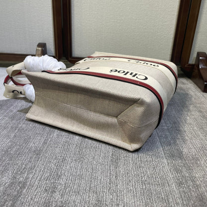 MEDIUM STRAP WOODY TOTE BAG 37 IN BEIGE LINEN CANVAS BLACK WEBBING LOGO EMBROIDER RED CALFSKIN