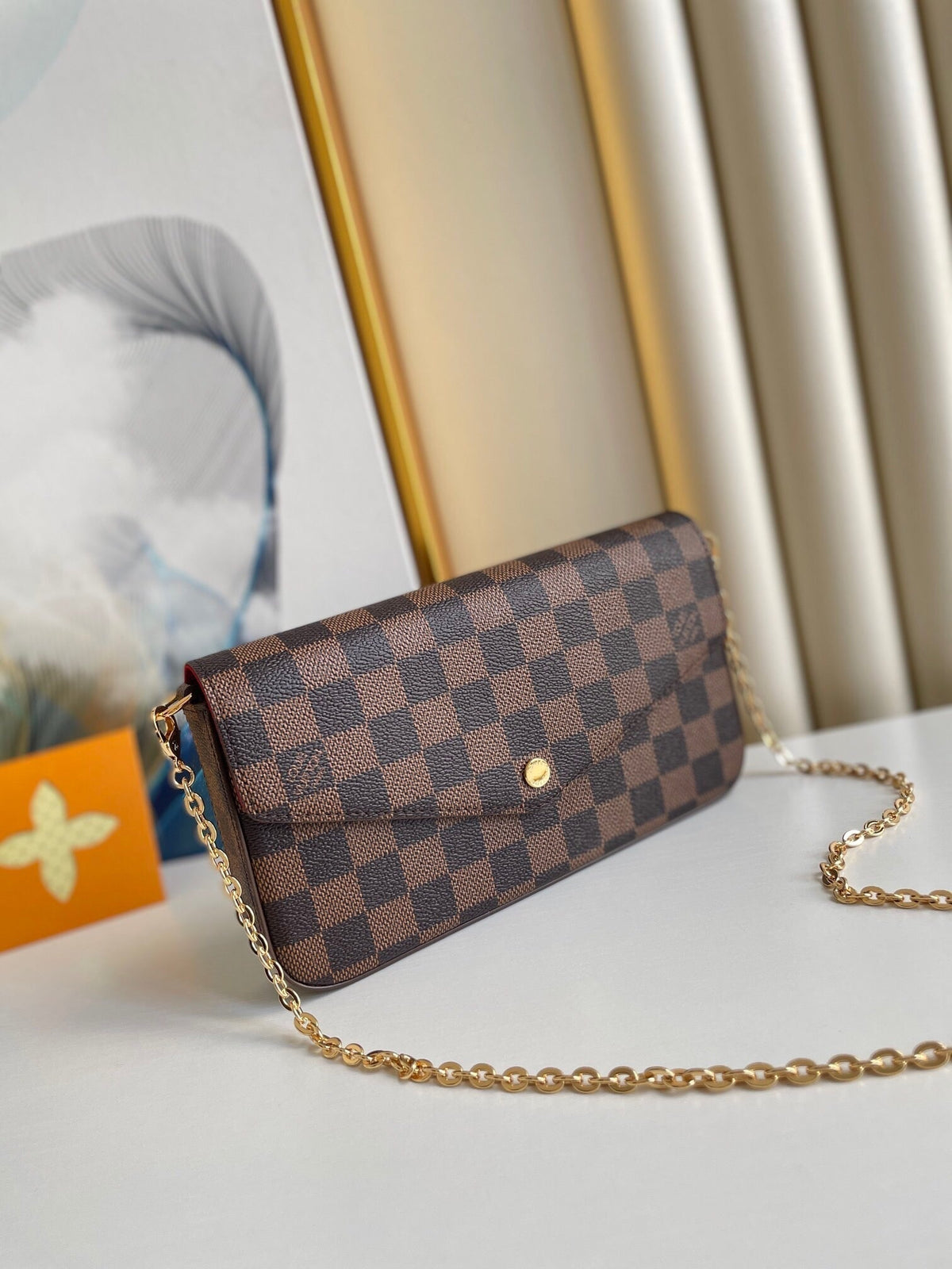 FÉLICIE POCHETTE 21 IN BROWN DAMIER EBENE COATED CANVAS GOLD HARDWARE