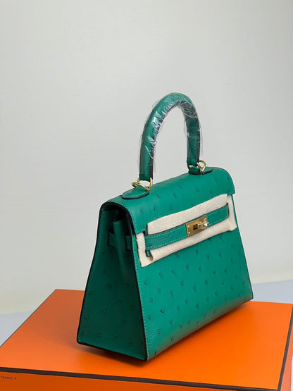 KELLY BAG 20 IN TEAL GREEN OSTRICH LEATHER WITH GOLD HARDWARE