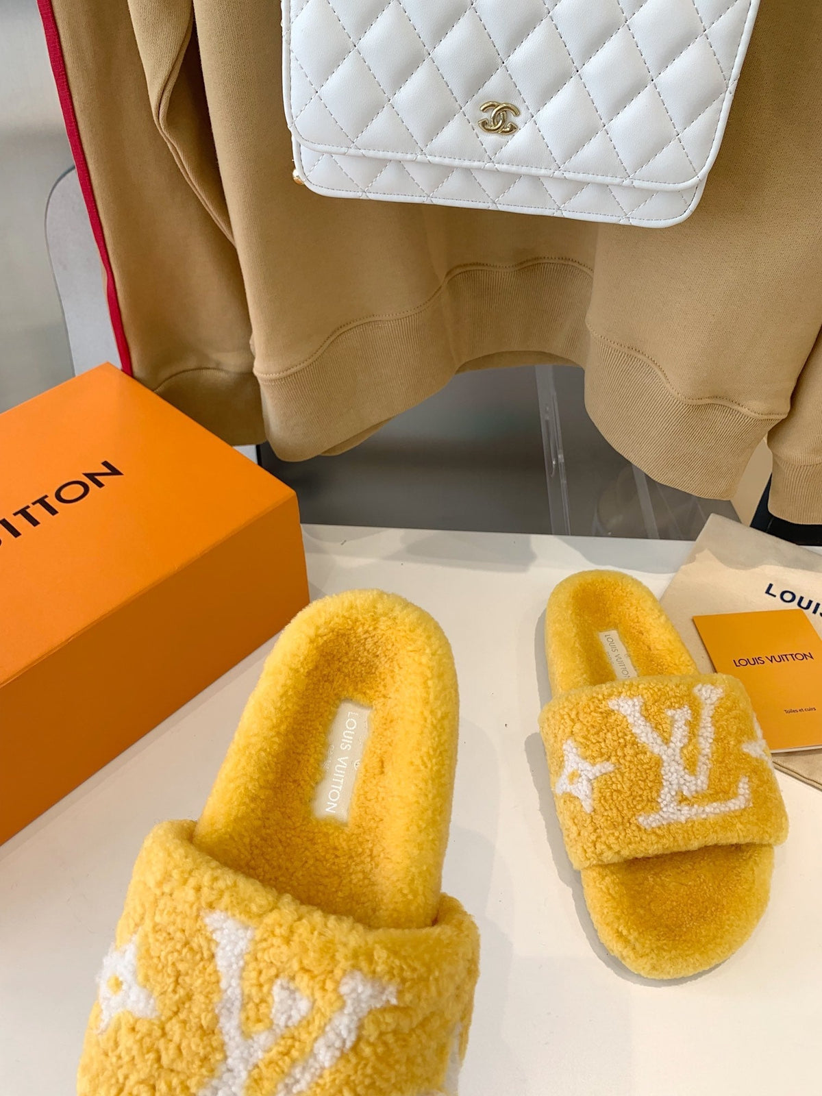 LV WOMEN'S PASEO FLAT SLIPPER IN YELLOW FLEECE WITH WHITE LOGO