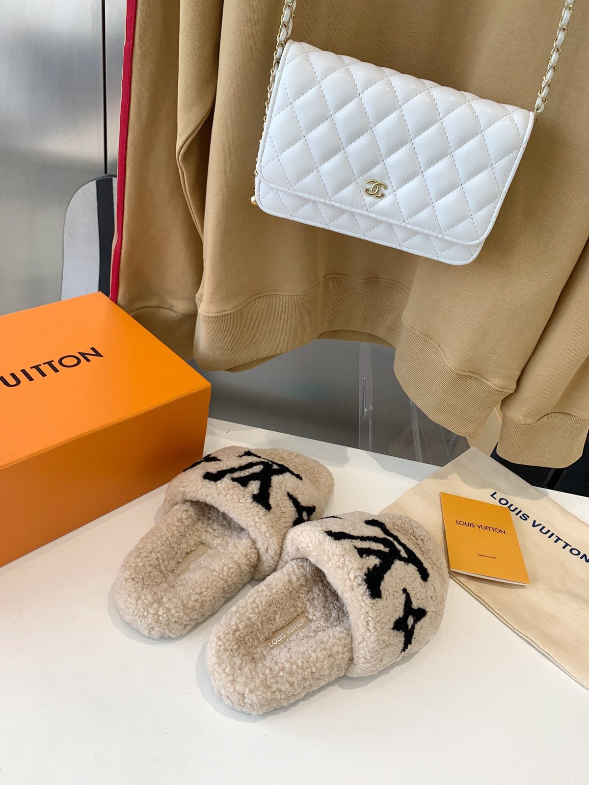LV WOMEN'S PASEO FLAT SLIPPER IN TAN BROWN FLEECE WITH BLACK LOGO