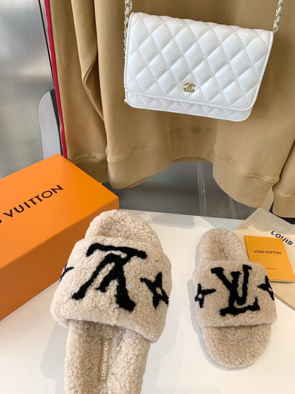 LV WOMEN'S PASEO FLAT SLIPPER IN TAN BROWN FLEECE WITH BLACK LOGO