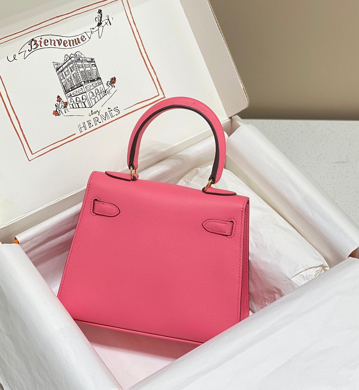 KELLY MINI 20 BAG IN WATERMELON PINK CALFSKIN WITH GOLD HARDWARE