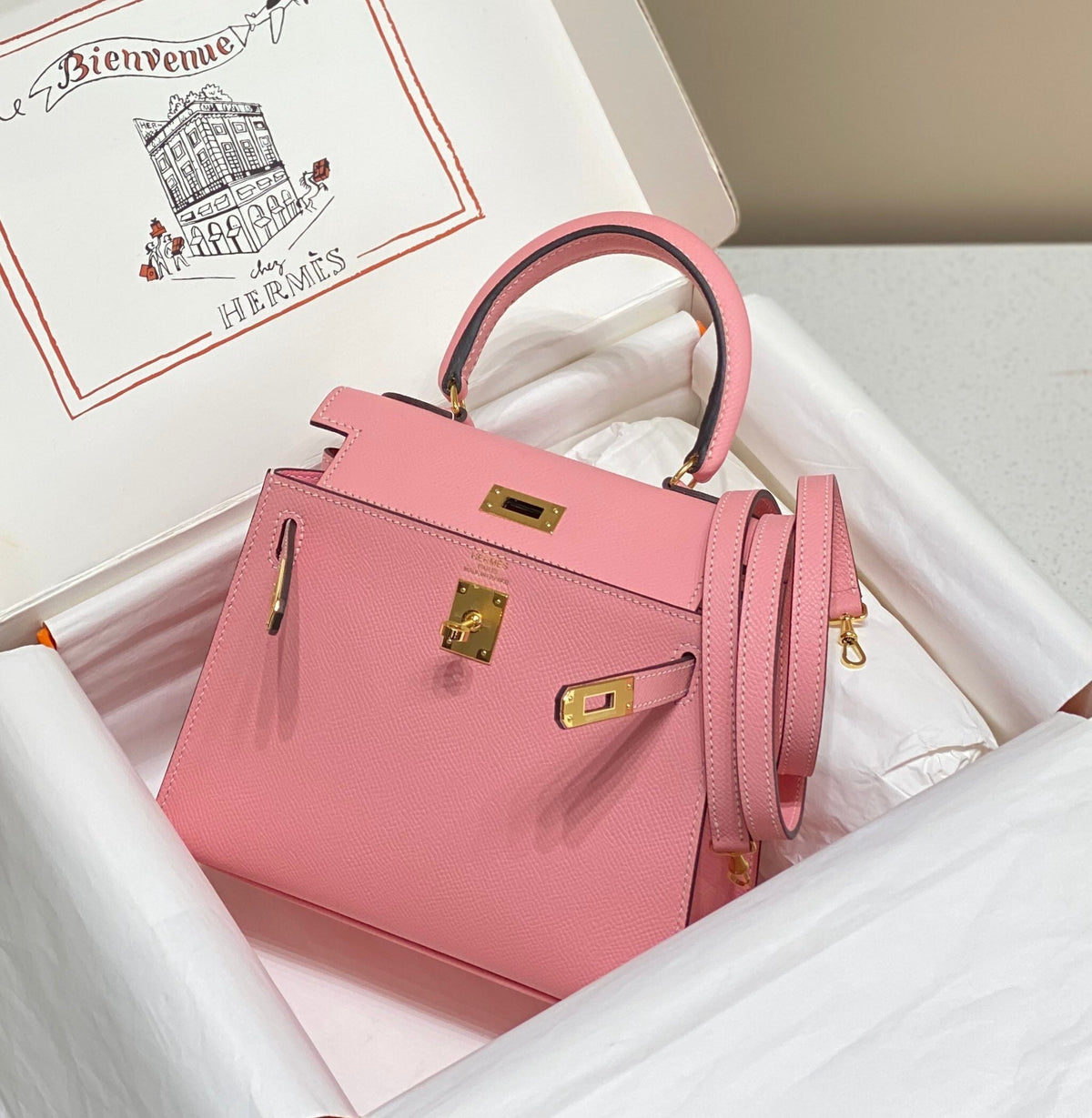 KELLY MINI 20 BAG IN ROUGE PINK CALFSKIN WITH GOLD HARDWARE