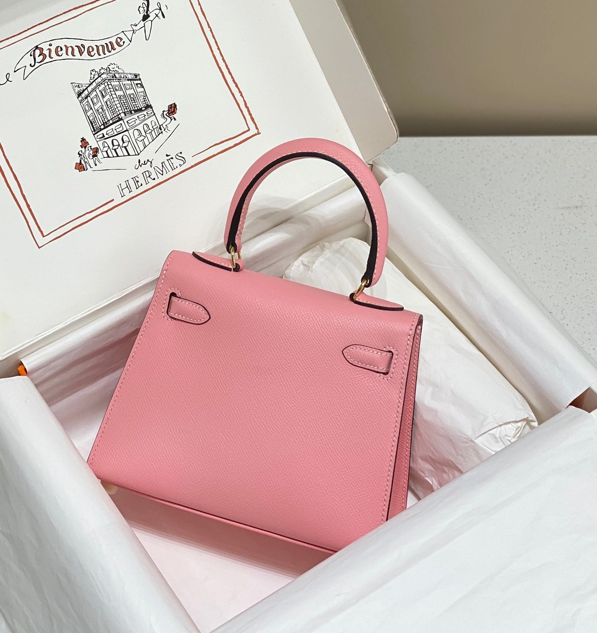 KELLY MINI 20 BAG IN ROUGE PINK CALFSKIN WITH GOLD HARDWARE