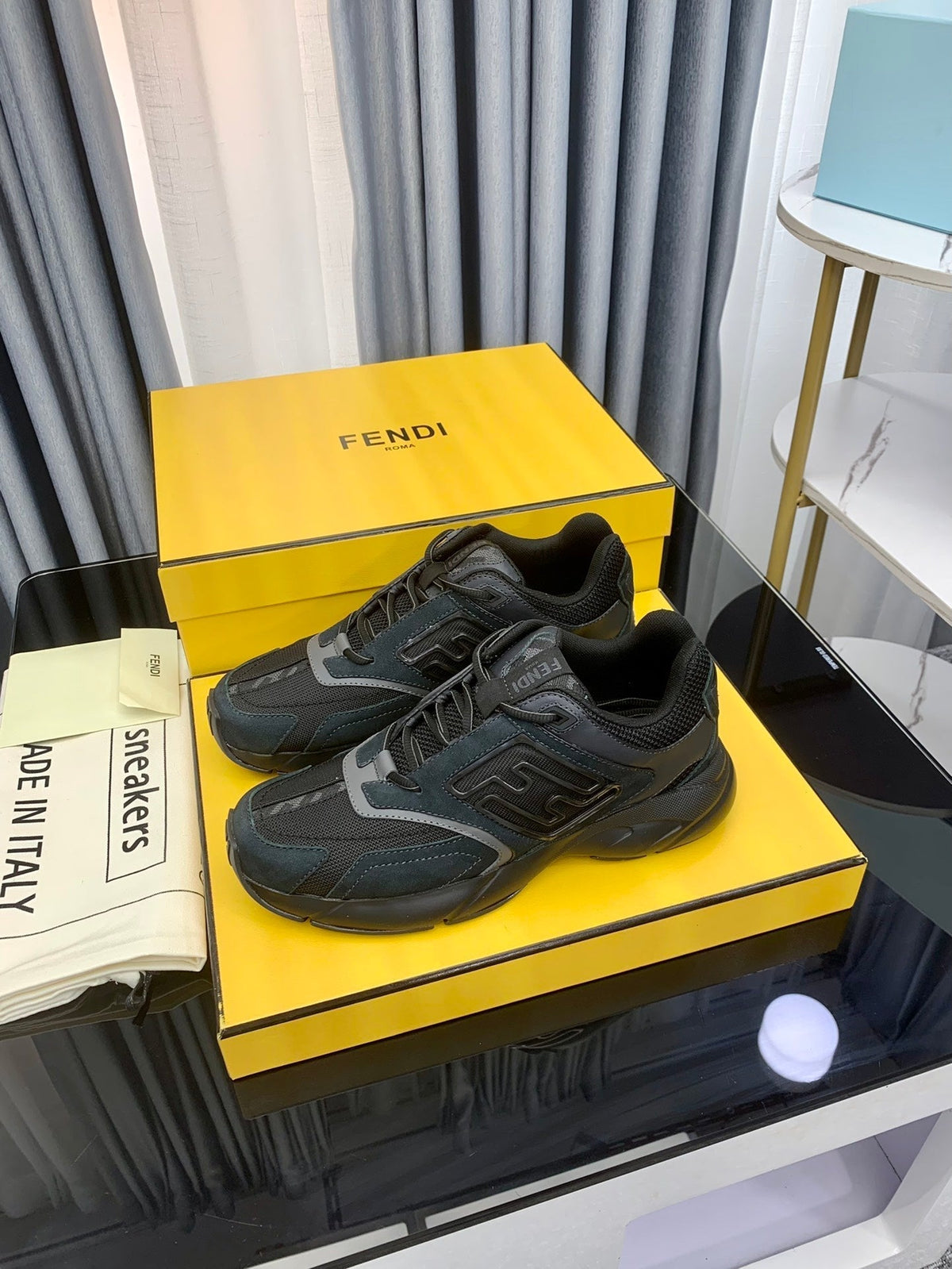 FENDI FASTER TRAINER IN BLACK CALFSKIN AND SUEDE