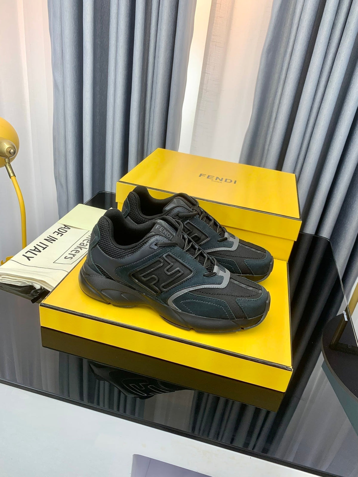 FENDI FASTER TRAINER IN BLACK CALFSKIN AND SUEDE