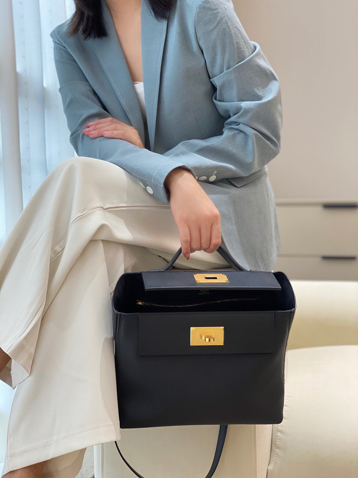 MINI 24/24 29CM IN BLACK EVERCOLOR CALFSKIN GOLD KELLY BUCKLE