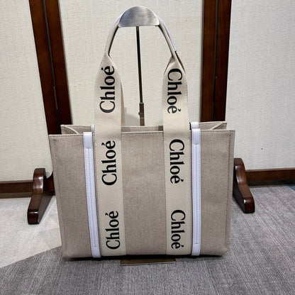 MEDIUM WOODY TOTE BAG 37 IN BEIGE LINEN CANVAS WEBBING BLACK LOGO EMBROIDER WHITE CALFSKIN