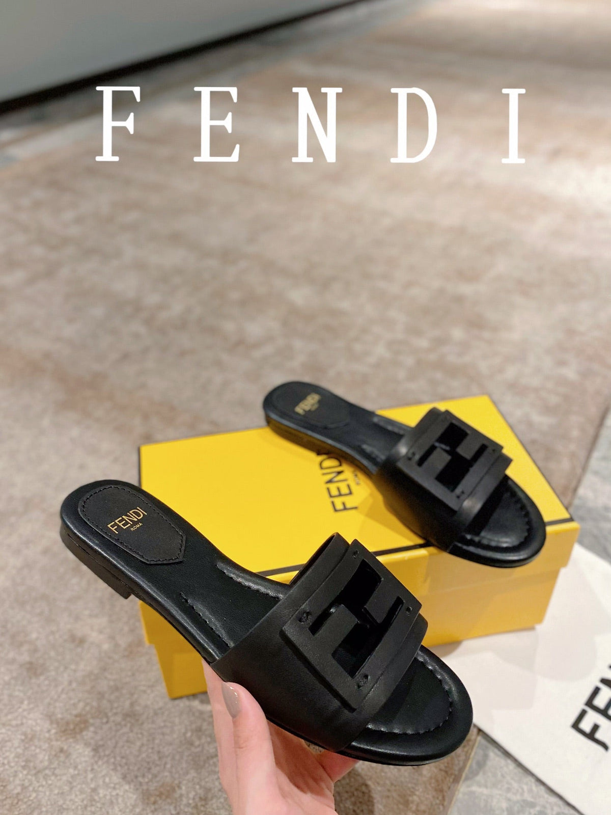 FENDI BAGUETTE SLIDES IN BLACK LAMBSKIN