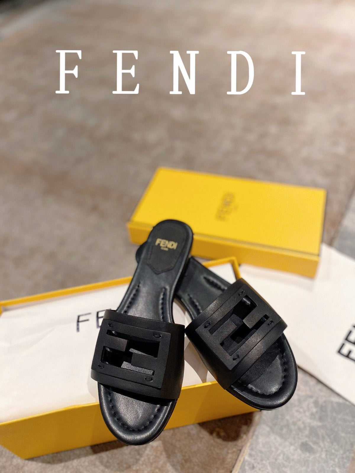 FENDI BAGUETTE SLIDES IN BLACK LAMBSKIN