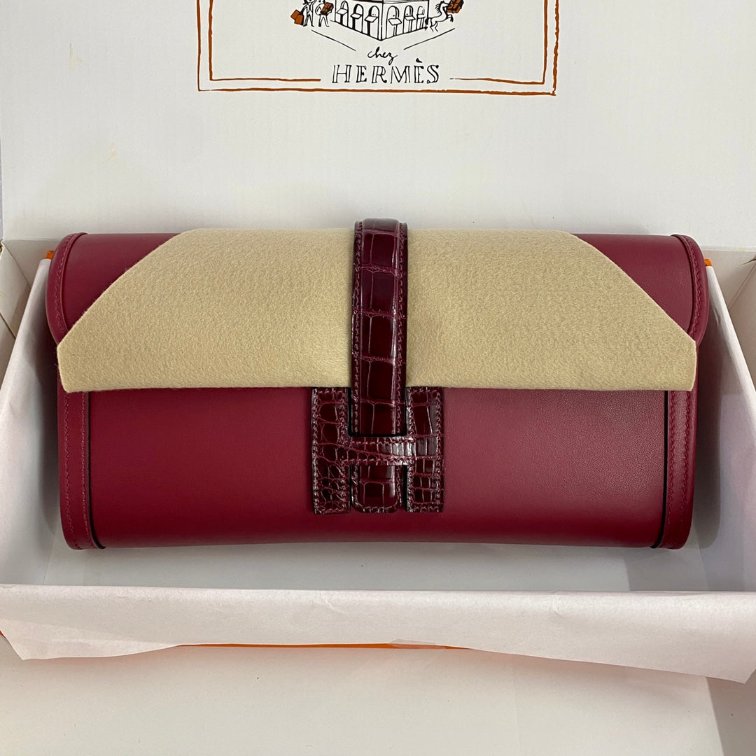 JIGE ELAN 29 CLUTCH IN CHERRY RED CALFSKIN WITH WINE RED LIZARD SKIN
