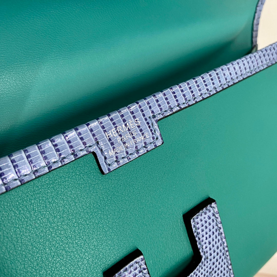 JIGE ELAN 29 CLUTCH IN TEAL GREEN CALFSKIN WITH ROYAL BLUE LIZARD SKIN