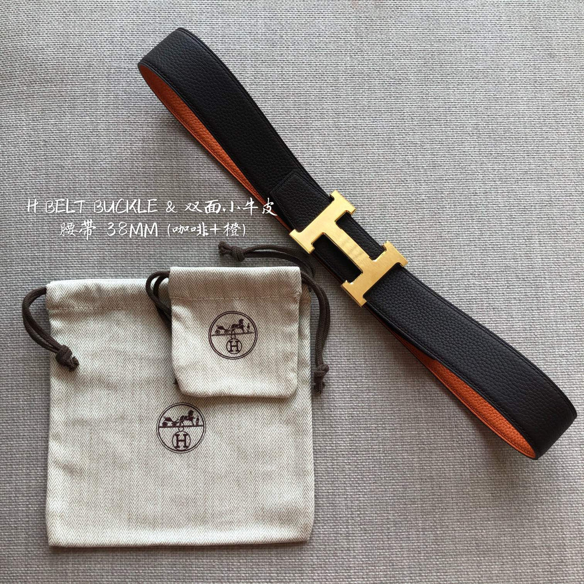 HM BELT BUCKLE & REVERSIBLE BLACK AND ORANGE LEATHER STRAP 38MM GOLD HARDWARE