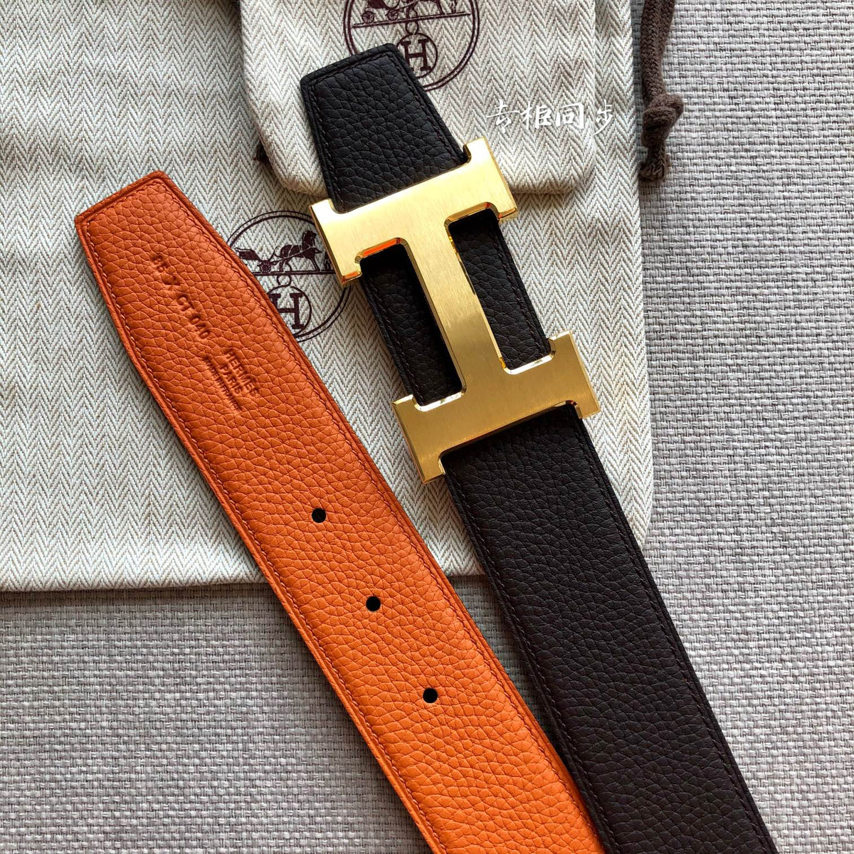 HM BELT BUCKLE & REVERSIBLE BLACK AND ORANGE LEATHER STRAP 38MM GOLD HARDWARE