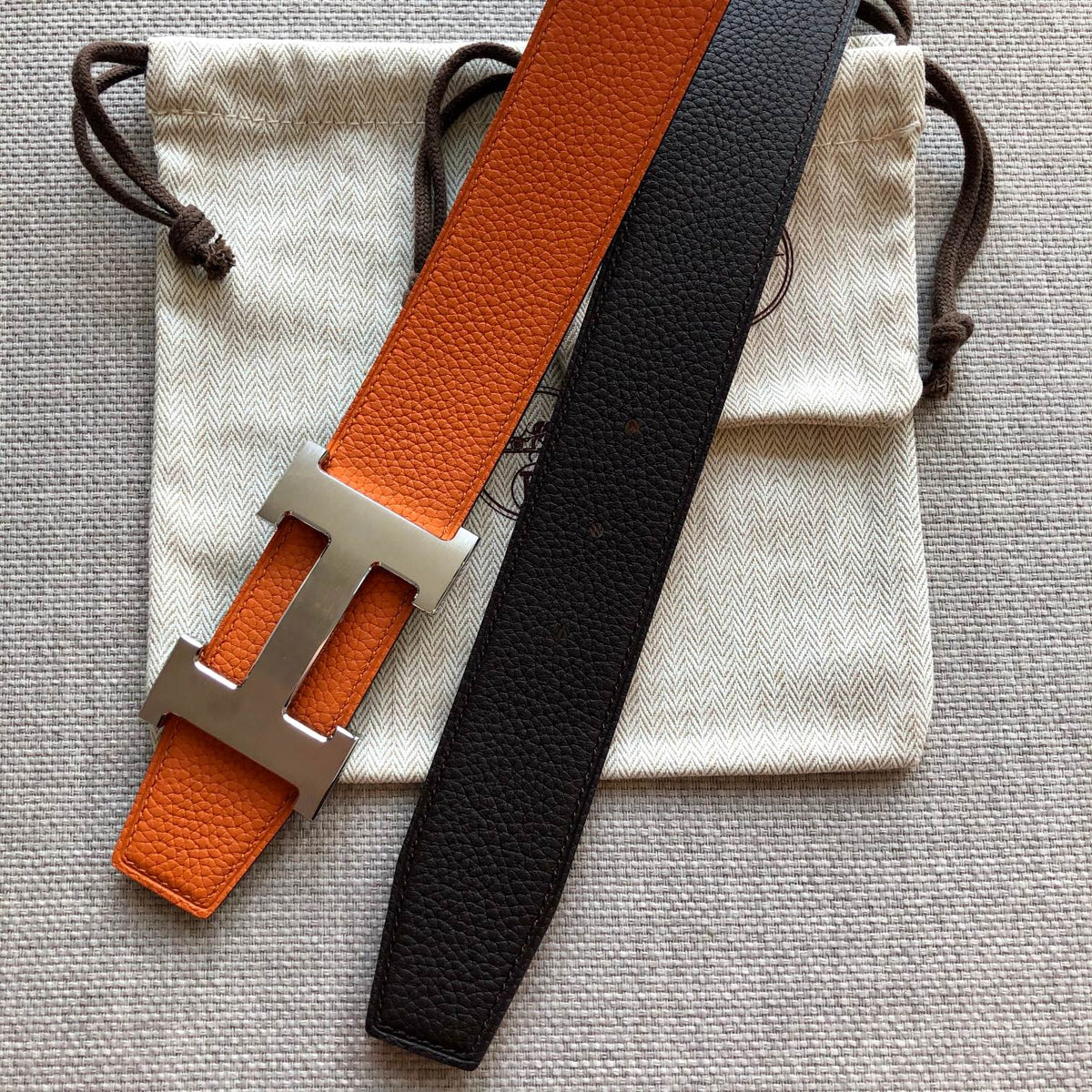 HM BELT BUCKLE & REVERSIBLE BLACK AND ORANGE LEATHER STRAP 38MM SILVER HARDWARE