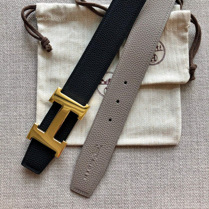 HM BELT BUCKLE & REVERSIBLE BLACK AND TAN BROWN LEATHER STRAP 38MM GOLD HARDWARE