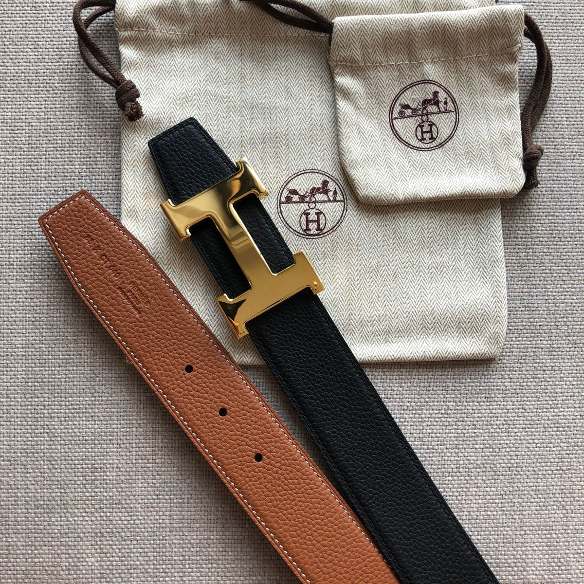 HM BELT BUCKLE & REVERSIBLE BLACK AND BRONZE BROWN LEATHER STRAP 38MM GOLD HARDWARE