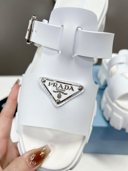 MONOLITH SLIPPER SANDALS IN WHITE RUBBER