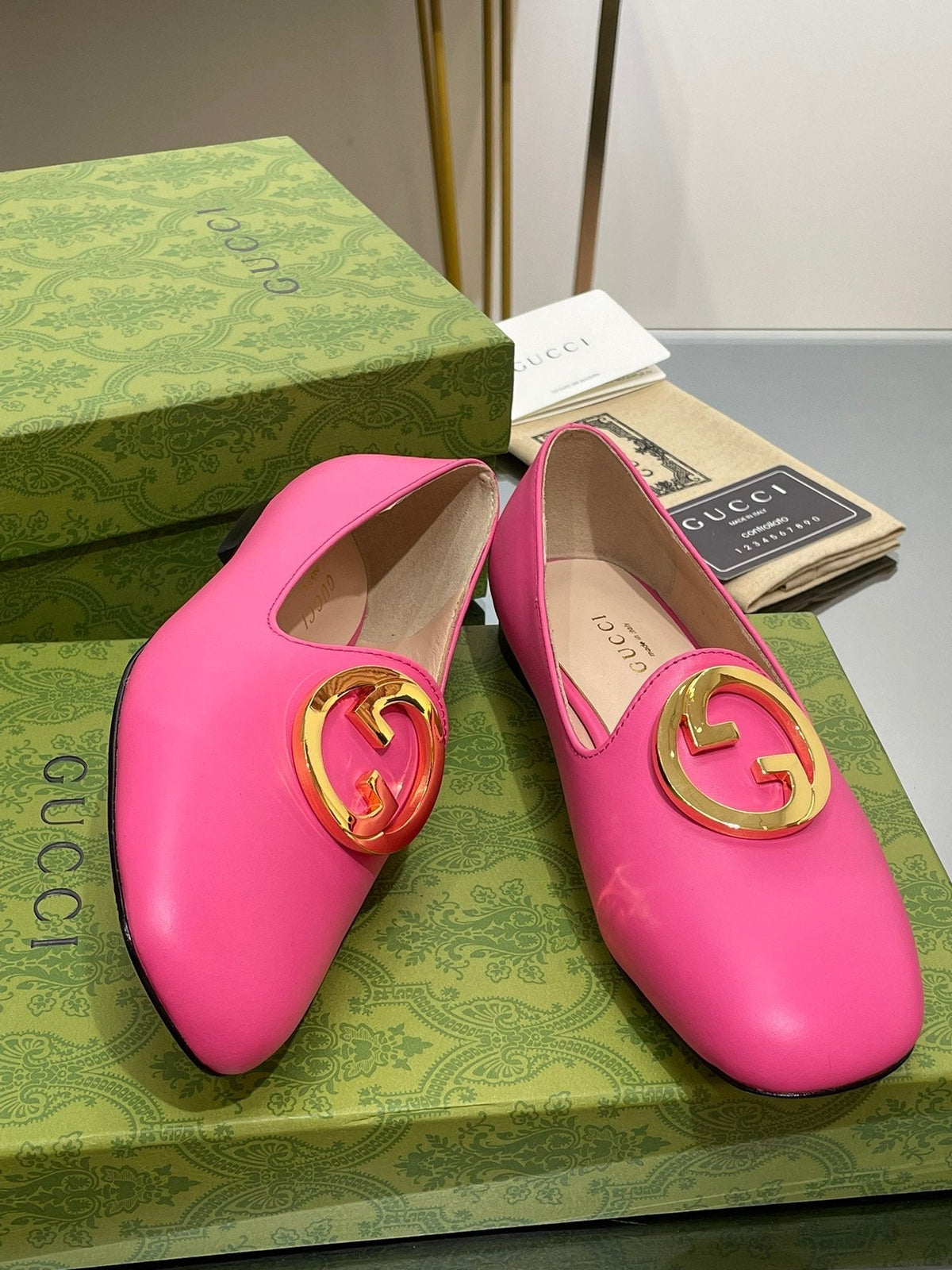 BLONDIE LOGO-PLAQUE LOAFERS IN BRIGHT PINK CALFSKIN WITH GOLD HARDWARE