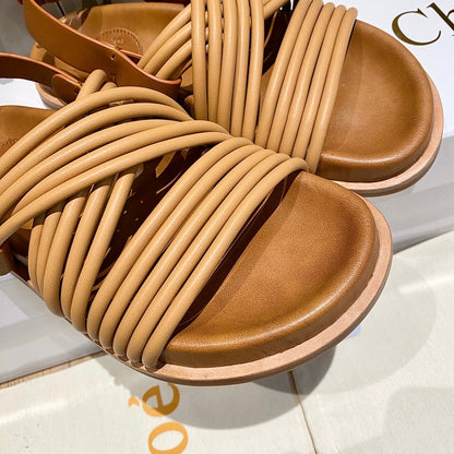 CROSS STRAP SANDAL IN BRONZE BROWN RUBBER WITH GOLD HARDWARE