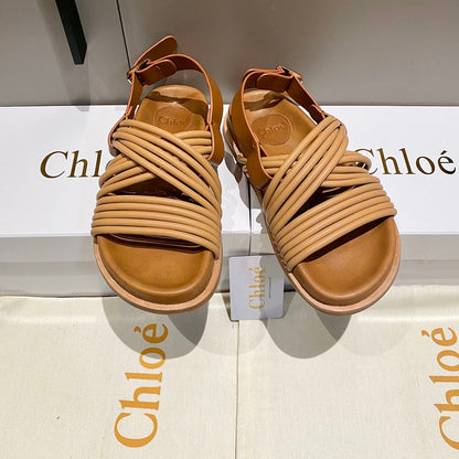 CROSS STRAP SANDAL IN BRONZE BROWN RUBBER WITH GOLD HARDWARE